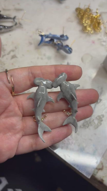 Aretes tiburones